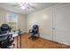 Home office features hardwood floors, ceiling fan and plenty of space for a desk and chairs at 707 Arlington Ave, Albemarle, NC 28001