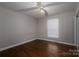 Simple bedroom with hardwood floors and window with blinds at 753 Schuyler Dr, Rock Hill, SC 29730