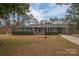 Brick ranch house with green shutters, solar panels, and a landscaped yard at 753 Schuyler Dr, Rock Hill, SC 29730
