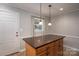 Kitchen with island and dark brown countertops at 753 Schuyler Dr, Rock Hill, SC 29730