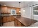 Kitchen with light wood cabinets, granite counters, and island at 753 Schuyler Dr, Rock Hill, SC 29730