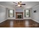 Living room showcasing a brick fireplace and hardwood floors at 753 Schuyler Dr, Rock Hill, SC 29730