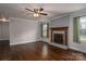 Living room with a brick fireplace and hardwood floors at 753 Schuyler Dr, Rock Hill, SC 29730
