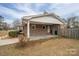 Brick home with covered patio and fenced yard at 753 Schuyler Dr, Rock Hill, SC 29730