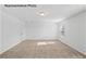 Spacious bedroom with neutral walls and wood-look flooring at 10003 Travis Floyd Ln # 050, Charlotte, NC 28214