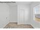 Bright bedroom with neutral walls and carpeting at 10003 Travis Floyd Ln # 050, Charlotte, NC 28214