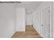 Bright and airy entry hall with light wood flooring at 10003 Travis Floyd Ln # 050, Charlotte, NC 28214