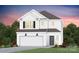 Two-story home with white siding, gray roof, and a two-car garage at 10003 Travis Floyd Ln # 050, Charlotte, NC 28214