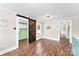 Bright kitchen with a rustic barn door and light wood flooring at 107 Arrowood Dr, Kings Mountain, NC 28086