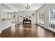 Bright dining room with hardwood floors and view to backyard at 116 Diamond Head Dr, Mooresville, NC 28117