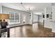 Open dining room, hardwood floors, and views to Gathering room and kitchen at 116 Diamond Head Dr, Mooresville, NC 28117