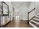 Spacious entryway with hardwood floors and staircase at 116 Diamond Head Dr, Mooresville, NC 28117