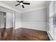 Home office featuring hardwood floors and wainscoting at 116 Diamond Head Dr, Mooresville, NC 28117