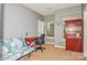 Well-lit bedroom with a desk and a bookshelf at 16718 Dolcetto Way, Charlotte, NC 28277
