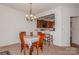 Open concept dining room with a view into the kitchen at 16718 Dolcetto Way, Charlotte, NC 28277