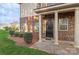 Brick front exterior with columns and a welcoming entrance at 16718 Dolcetto Way, Charlotte, NC 28277