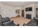Spacious living room with fireplace and ample natural light at 16718 Dolcetto Way, Charlotte, NC 28277