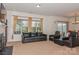 Bright living room with large windows and comfortable seating at 16718 Dolcetto Way, Charlotte, NC 28277