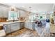 Open kitchen with island and view into the adjacent living area at 226 Hickory St, Locust, NC 28097