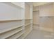 Large walk-in closet with ample shelving and hanging space at 2810 Selwyn Ave # 418, Charlotte, NC 28209