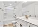 Clean bathroom with white vanity, bathtub, and gold accents at 3050 Swallowtail Ln, Kannapolis, NC 28083