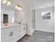 Elegant bathroom with double vanity and a large shower at 3050 Swallowtail Ln, Kannapolis, NC 28083