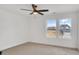 Spacious bedroom with carpet, ceiling fan and large windows at 3050 Swallowtail Ln, Kannapolis, NC 28083