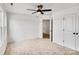 Bright bedroom with carpet, ceiling fan and double doors at 3050 Swallowtail Ln, Kannapolis, NC 28083