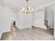 Spacious dining area with hardwood floors and chandelier at 3050 Swallowtail Ln, Kannapolis, NC 28083