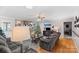 Living room with fireplace, hardwood floors, and comfy sofas at 3105 Hilton Rd, Rock Hill, SC 29732