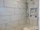 Walk-in shower with marble tile and built-in niche at 415 Newstyle Way # 6, Cramerton, NC 28056