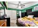 Green-walled bedroom with a queen bed and dresser at 513 Bell Rd, Kings Mountain, NC 28086