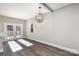 Bright dining room features hardwood floors and French doors leading to a deck at 626 Smith St, Kannapolis, NC 28083