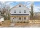 Two-story house with white siding, a pergola, and a wooden fence at 626 Smith St, Kannapolis, NC 28083