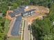 Aerial view of new townhome community with ample green space at 7022 Impulse Ct, Charlotte, NC 28205