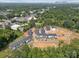 Aerial view of townhomes and surrounding landscape at 7022 Impulse Ct, Charlotte, NC 28205