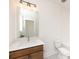 Clean bathroom with modern vanity and geometric tile floor at 7022 Impulse Ct, Charlotte, NC 28205