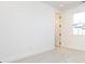 Spacious bedroom with neutral carpeting and large window at 7022 Impulse Ct, Charlotte, NC 28205