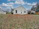 House exterior view of the back with patio at 7225 Preakness Stakes Ln, Charlotte, NC 28215