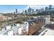 Aerial view of modern townhouses near the city skyline and stadium at 914 Westmere Ave, Charlotte, NC 28208