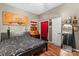 King-size bed and built-in shelving in this bedroom at 10375 Cool Springs Rd, Woodleaf, NC 27054