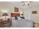 Spacious bedroom with double doors and ceiling fan at 1187 Janrose Nw Ct # 37, Concord, NC 28027