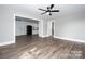 Open living room with view into kitchen and hallway at 1327 F Se Ave, Hickory, NC 28602