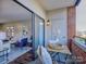 Balcony with seating and a view into the living room at 224 N Poplar St # 19, Charlotte, NC 28202