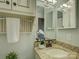 Small bathroom with granite countertop and a white vanity at 224 N Poplar St # 19, Charlotte, NC 28202