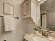 Clean bathroom with granite countertop and updated vanity at 224 N Poplar St # 19, Charlotte, NC 28202
