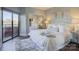 Bright bedroom with king-size bed and access to balcony at 224 N Poplar St # 19, Charlotte, NC 28202
