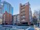 Brick building exterior, featuring multiple levels and parking at 224 N Poplar St # 19, Charlotte, NC 28202