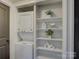 Stackable washer and dryer with additional shelving at 224 N Poplar St # 19, Charlotte, NC 28202