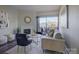 Spacious living room with hardwood floors and a cozy fireplace at 224 N Poplar St # 19, Charlotte, NC 28202